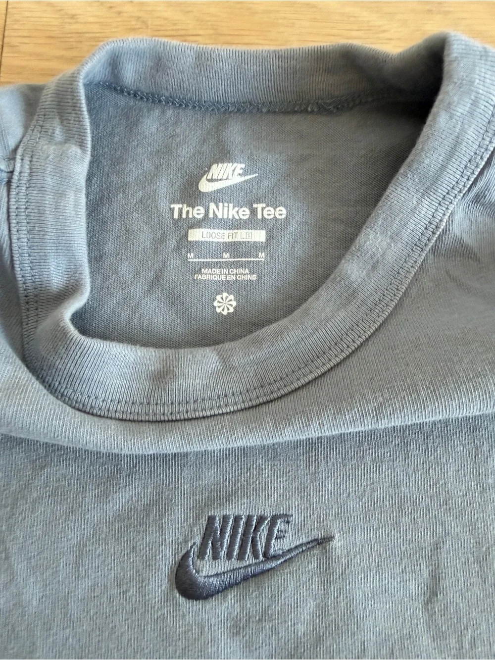 Nike Short Sleeve Loose Fit Crew T-Shirt in Light Blue with Small Logo